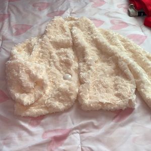 Selling this cute little coat??